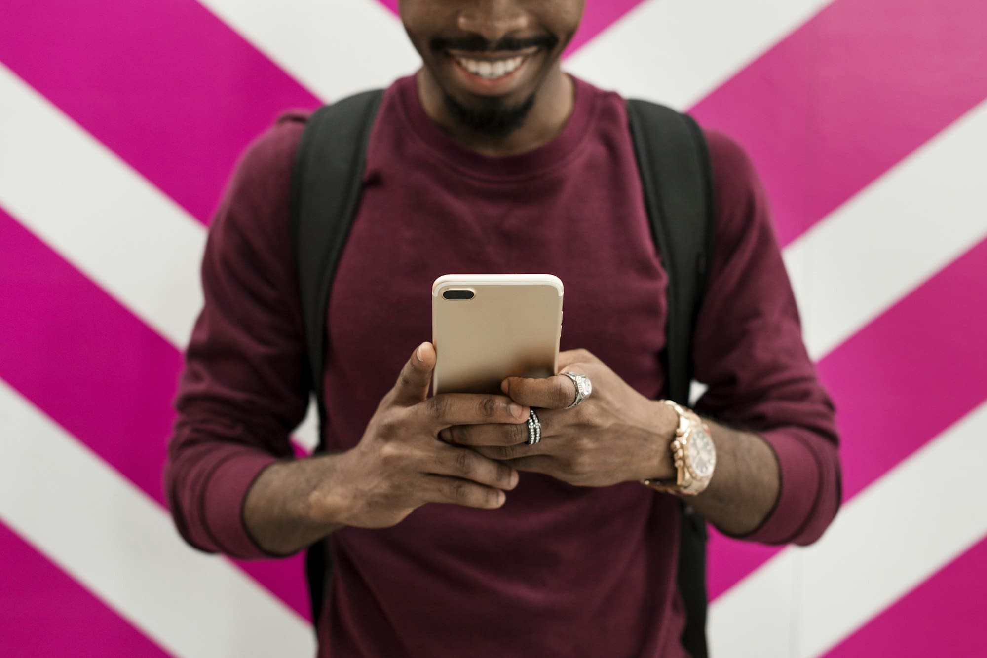 African man using mobile phone